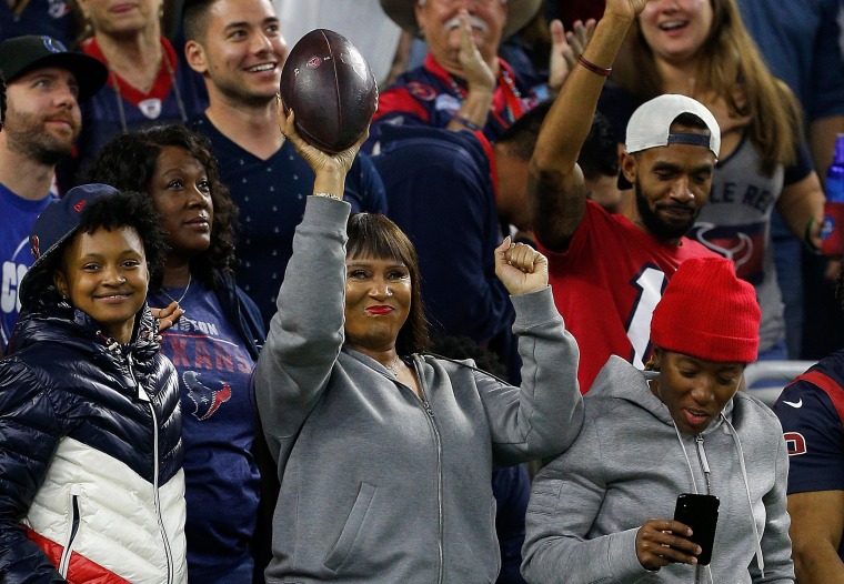 DeAndre Hopkins giving mom Sabrina Greenlee the football