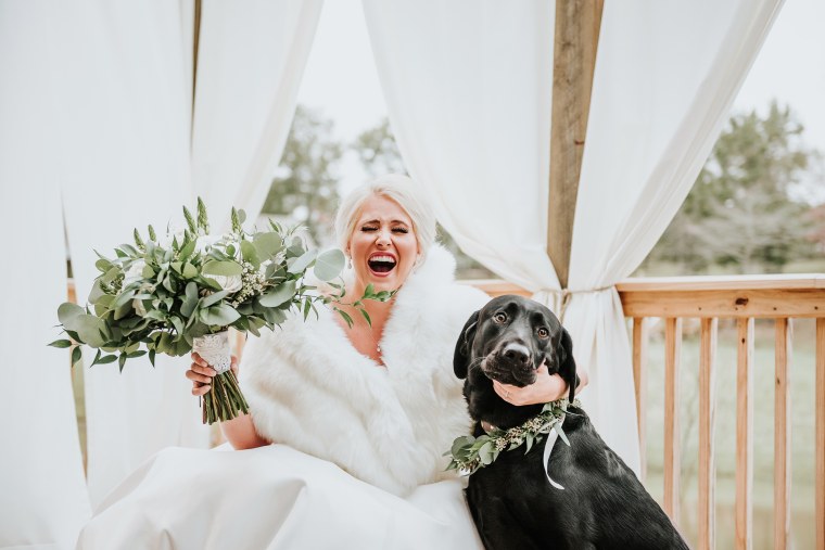 Bride poses for 'first look' photos with dog