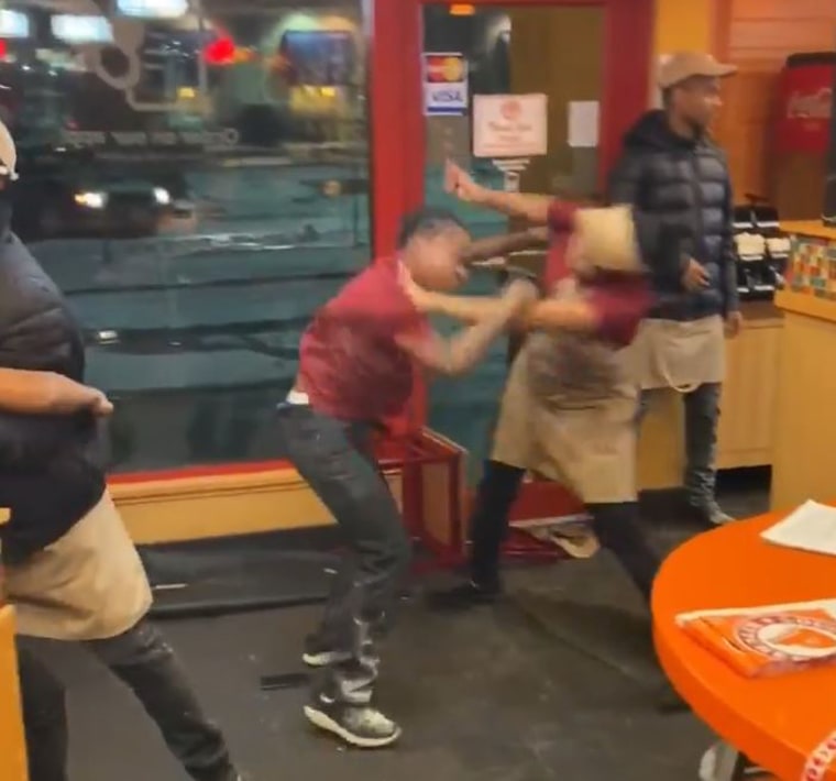 Two people fighting at a Popeyes in Milwaukee.
