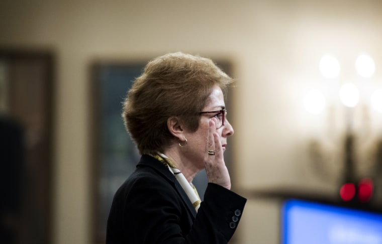 Image: Former Ambassador to Ukraine Marie Yovanovitch is sworn in during an impeachment hearing on Capitol Hill on Nov. 13, 2019.