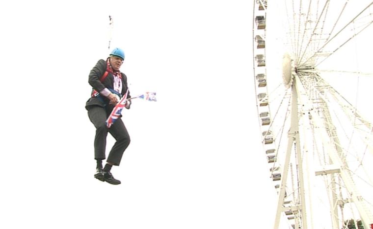 Image: London Mayor Boris Johnson gets stuck on a zipwire on Aug. 1, 2012.