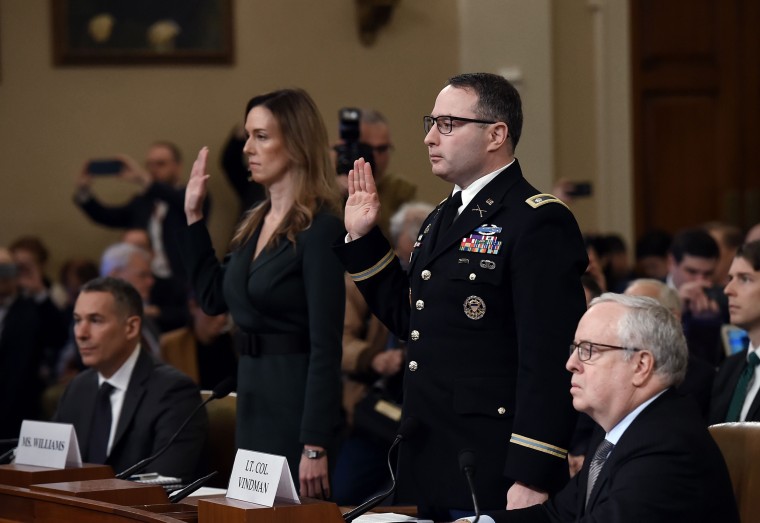 National Security Council Ukraine expert Lieutenant Colonel Alexander Vindman and Jennifer Williams, an aide to Vice President Mike Pence are sworn in before the House Intelligence Committee on November 19, 2019.
