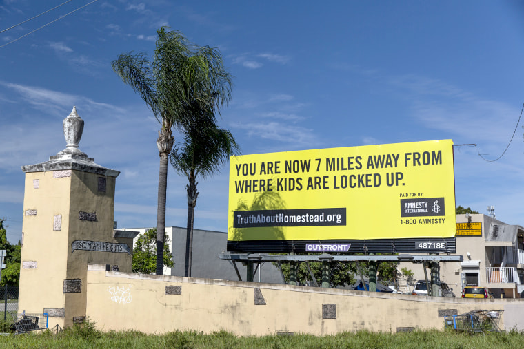 A billboard by Amnesty International USA in Miami, near Homestead, Fla, a facility that until recently was housing detained immigrant children.