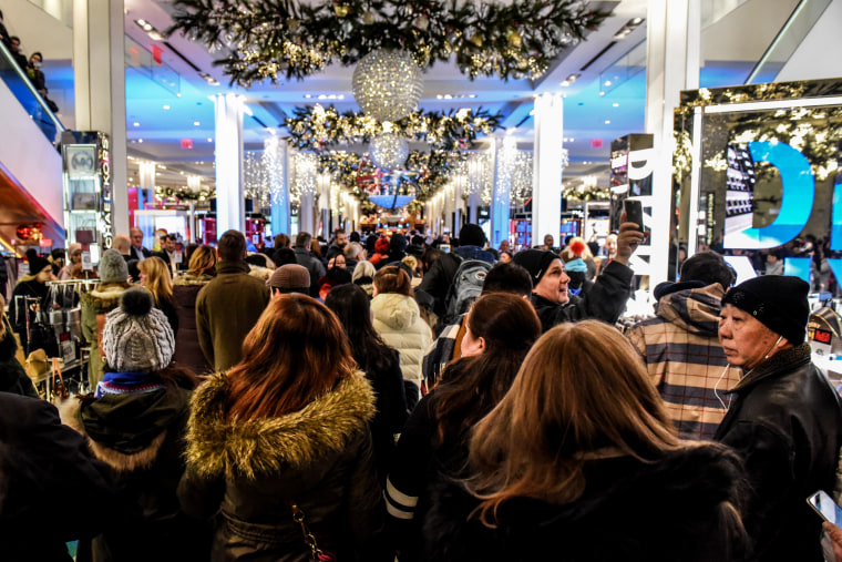 Image: Shoppers enter Macy's on Black Friday in 2017.