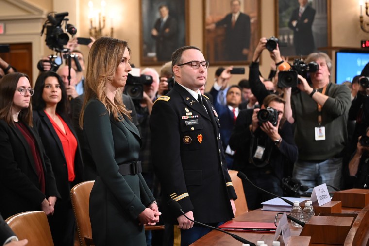 Image: Lieutenant Colonel Alexander Vindman and Jennifer Williams arrive to testify during the House Intelligence Committee hearing on Capitol Hill