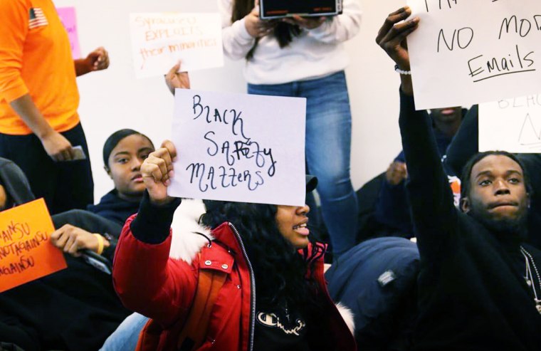 Image: Syracuse University students participate in a campus sit-in after the school experienced a series of racist incidents.