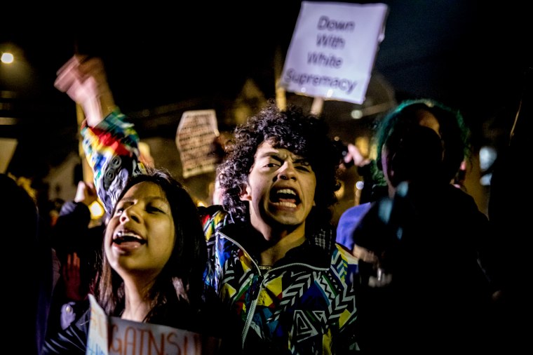 Image: Students chant at a rally against white supremacy on the Syracuse University campus in New York on Nov. 20, 2019.