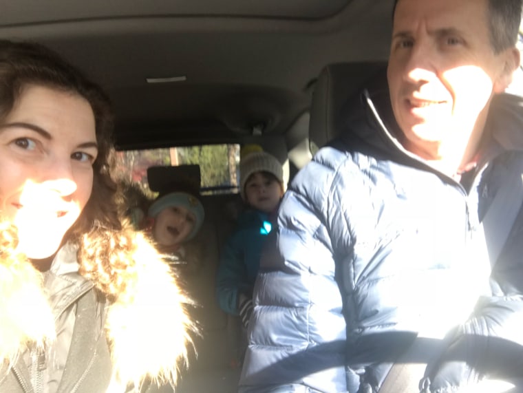 Koenig, her husband, and their two children on the way to deliver food on Thanksgiving with Meals on Wheels.
