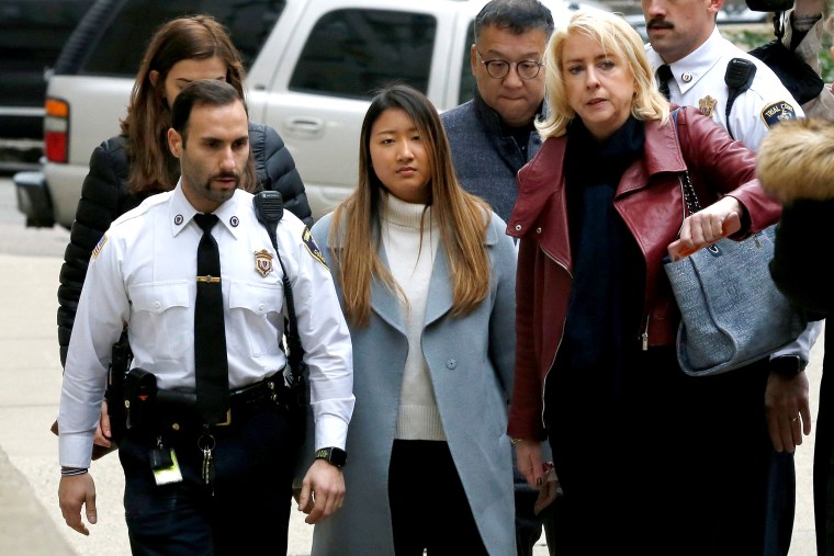Image: Inyoung You, a former Boston College student from South Korea, arrives to be arraigned on involuntary manslaughter