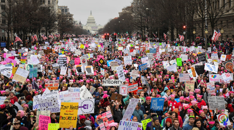 Image: Hundreds of thousands march down Pennsylvania Avenue during the Women's March in Washington