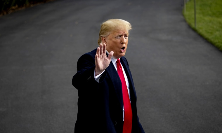 Image: President Donald Trump waves as he walks to board Marine One on the South Lawn of the White House on Nov. 20, 2019.