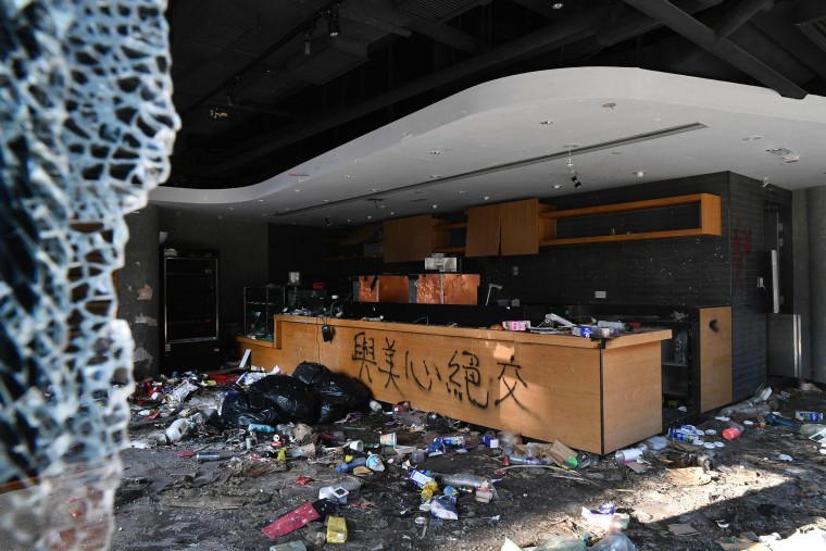 Image: A badly damaged Starbucks coffee shop is pictured on the Hong Kong Polytechnic University campus in the Hung Hom district of Hong Kong