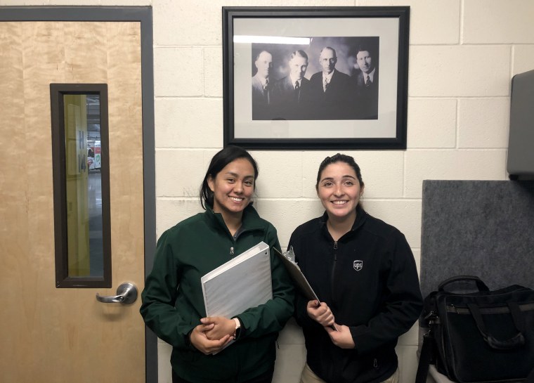 UPS employees Danya Lopez and Jema Albarran at the company shipping hub in Lathrop, Calif. First hired as seasonal workers, they now both work for UPS full-time.