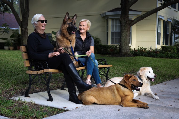 Mika Brzezinski with her mom, Emilie, and their family dogs Scout, Cajun and Daisy.