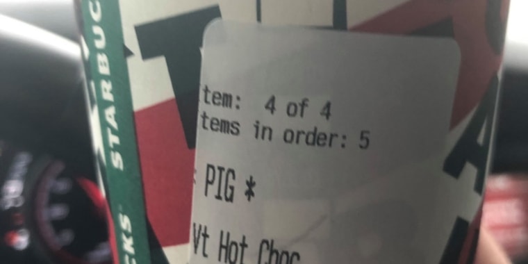 Starbucks has issued an apology and fired an employee after an Oklahoma police officer was given a cup with "pig" printed on it. 