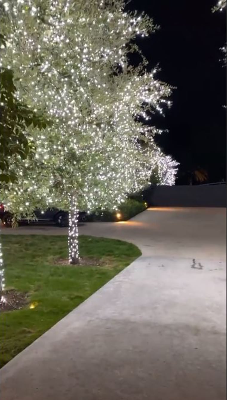 Kim Kardashian West opted for bright white lights on her trees outside.