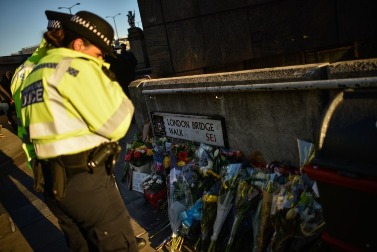 Image: Floral tributes are left for Jack Merritt and Saskia Jones, who were killed in Friday's terror attack on London Bridge.