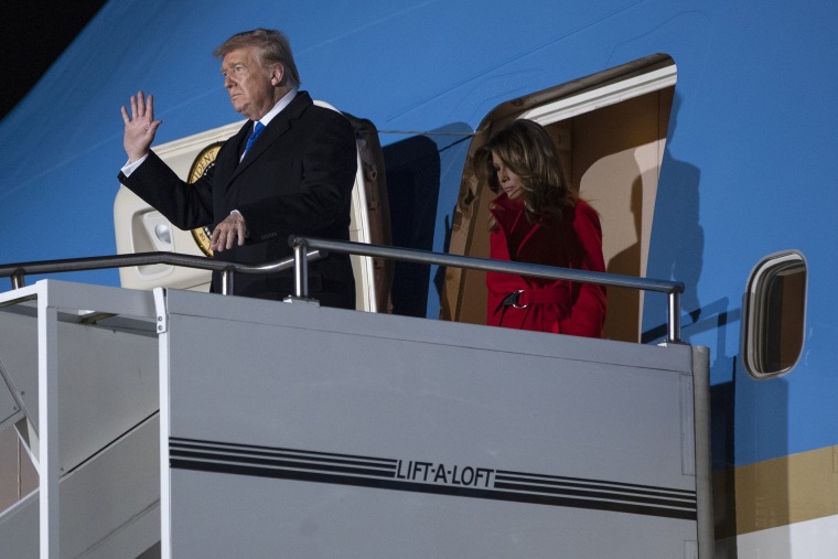 Image: President Donald and first lady Melania Trump arrive at London Stansted Airport to attend the NATO summit