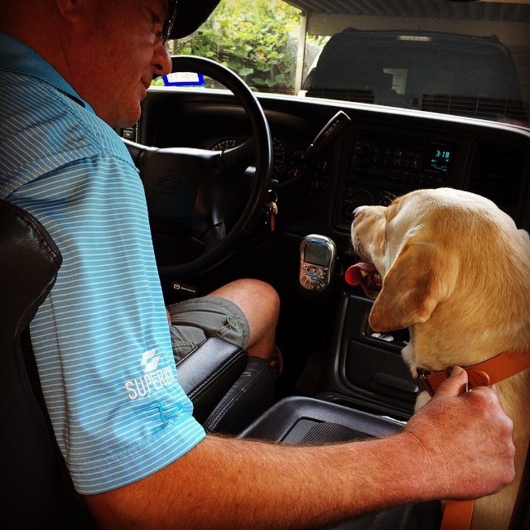 Maggie Falconer's husband, Tom, and dog, Duke.