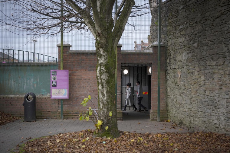 Image: A gate entry to the Fountain estate. The gate is closed every evening to prevent anyone entering the estate from the city side.