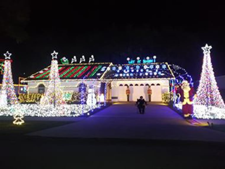 Kaitlyn De Jesus enjoying Don Weaver's Christmas lights. 