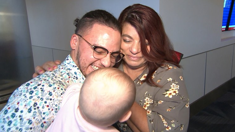 Kristin Cooke, left, embracing his birth mother, Tina Bejarano Gardere, and his 1-year-old daughter.