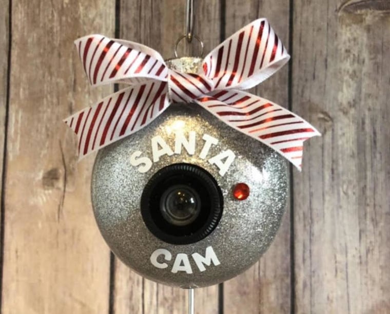 Hanging a "Santa Cam" ornament on your Christmas tree is one way to convince kids they're being watched by Santa Claus.