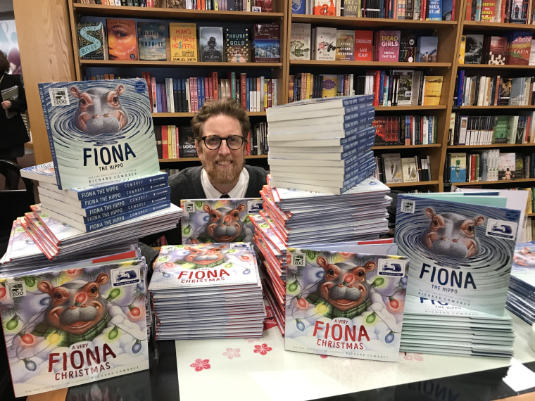 Illustrator Richard Cowdrey smiles at a book signing for "A Very Fiona Christmas."