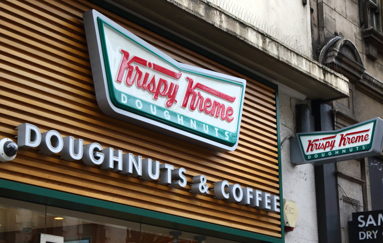 Image: Krispy Kreme store and brand logo seen in London, UK