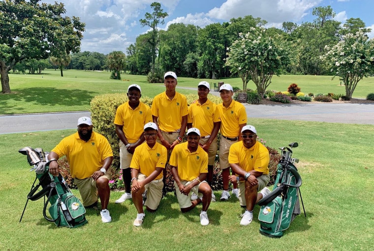 The Drew Charter School boys golf team, with coaches Joe Weems and Nyre Williams, at the Georgia State Golf Championship in May.