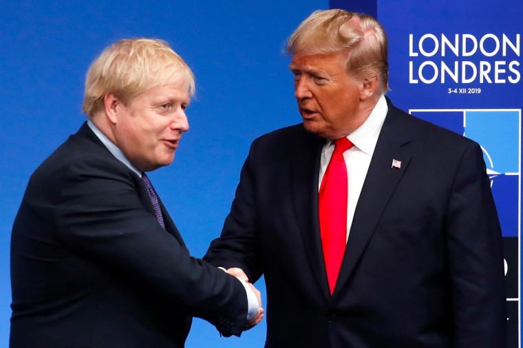 Image: Britain's Prime Minister Boris Johnson greets President Donald Trump at the NATO meeting in London on Dec. 4.