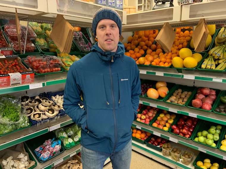Image: Chris Christopher, 34, runs a fruit and veg shop, Bolsover, Derbyshire, the day after the general election on Dec. 12, 2019.