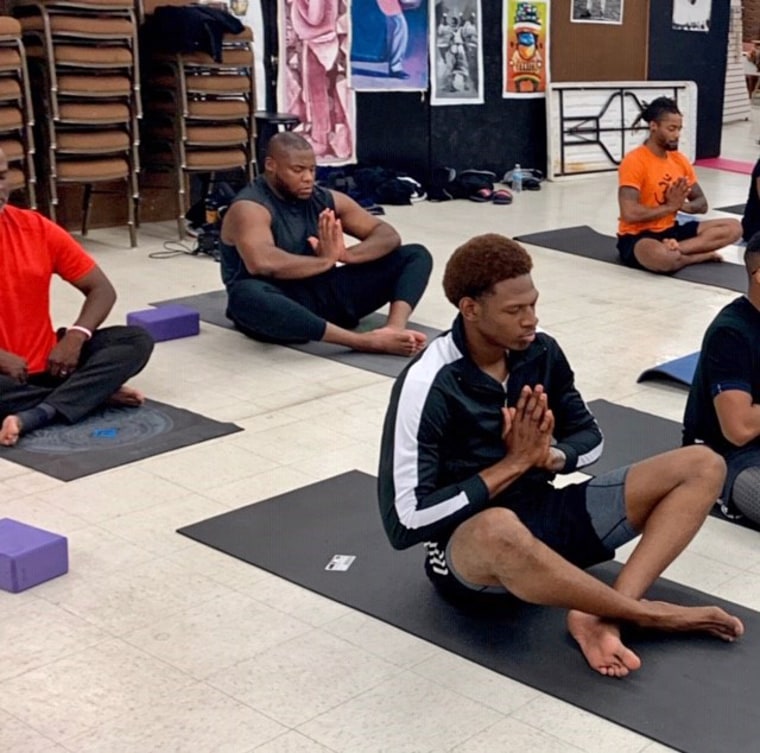 How one man is trying to help fellow black men 'heal' through yoga