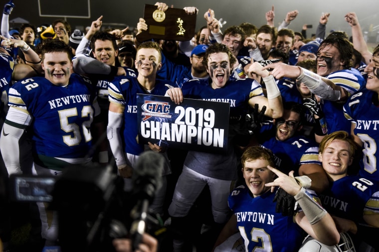 The Newtown High School football team savored an incredible state title that came on the seven-year anniversary of the mass shooting at Sandy Hook Elementary School. 