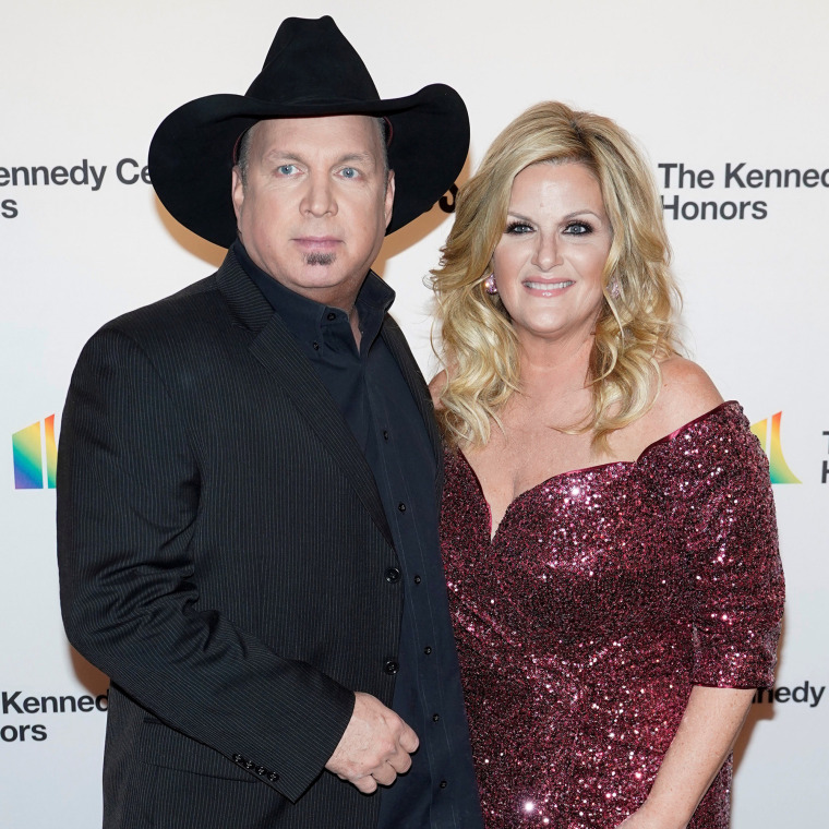 Garth Brooks and Trisha Yearwood arrive for the 42nd Annual Kennedy Awards Honors in Washington