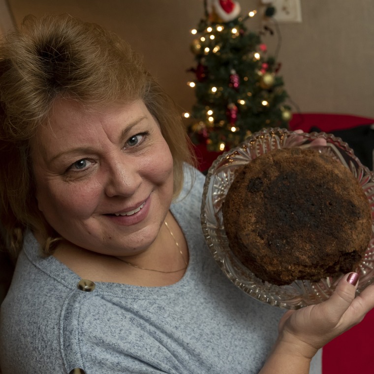 Julie Ruttinger calls the 141-year-old fruitcake that was baked by her great-great grandmother, "a legacy"