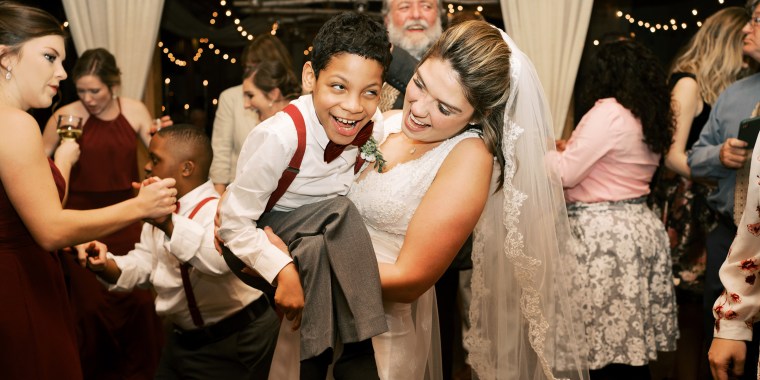 When Colleen Powell walked down the aisle at her wedding, she was accompanied by two important men in her life: Her father, Greg Costello, and 10-year-old Dominic May.