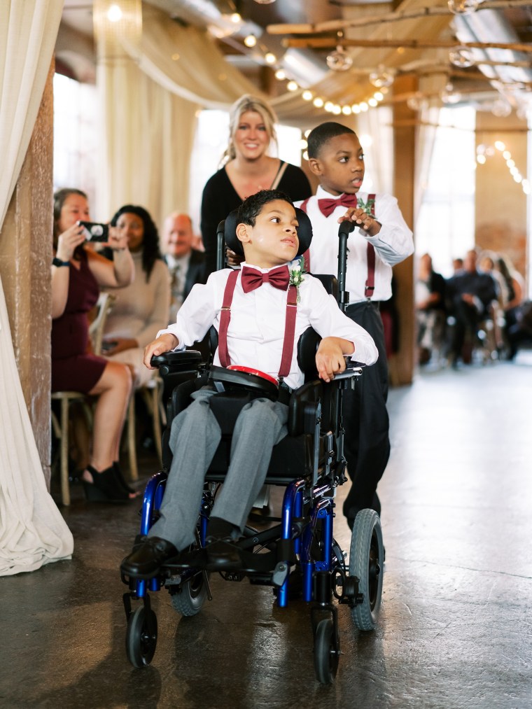 When Colleen Powell stood on the alter, Jay accidentally pressed his button that shared the recorded message: "Here comes the bride." His mom worried that Powell might get upset. Instead she laughed and quipped the bride was already there. 
