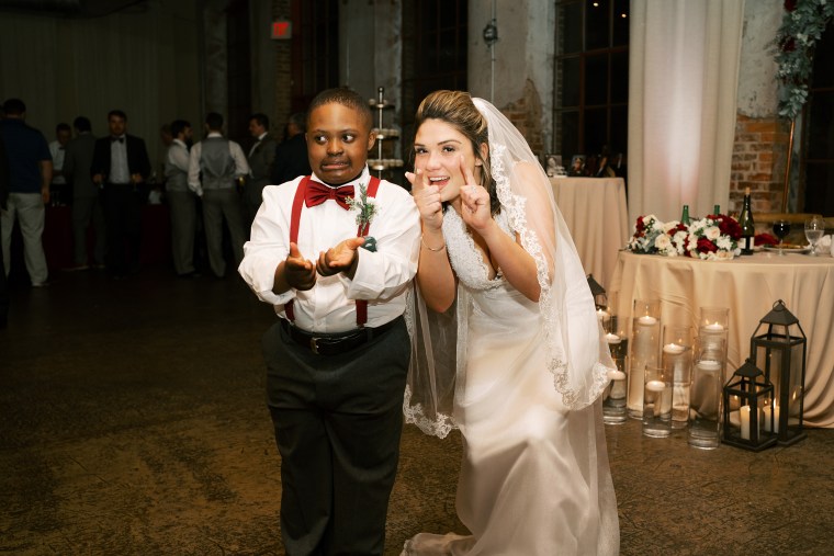 Dominic loved being at a wedding reception and especially enjoyed getting all the attention from the bridesmaids. 