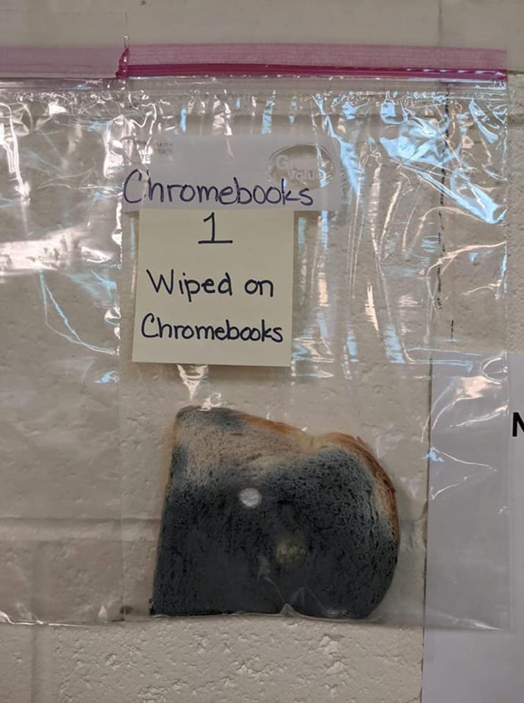 The teachers wiped a class Chromebook on the bread to show students the importance of regularly sanitizing their laptops. 
