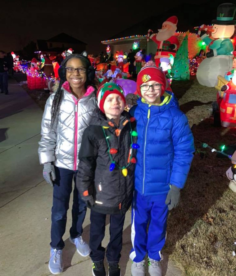 Dominic poses with his friends on Thursday night at the block party.