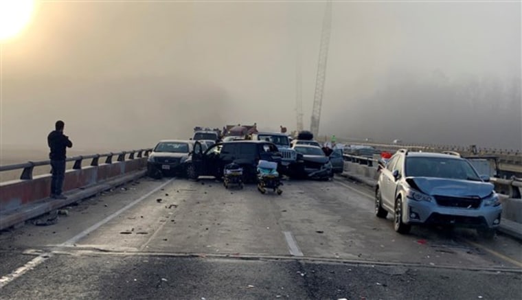 Damaged vehicles are seen on I-64 in Virginia after a pile-up that injured at least 51 people on Dec. 22, 2019.