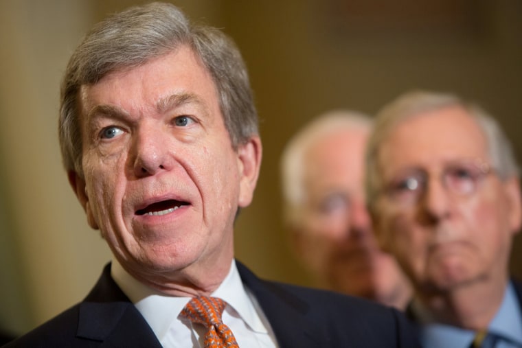 Image: Flanked by fellow Republicans, Sen. Roy Blunt (R-MO) speaks to Capitol Hill reporters following the Republicans' weekly policy luncheon in Washington