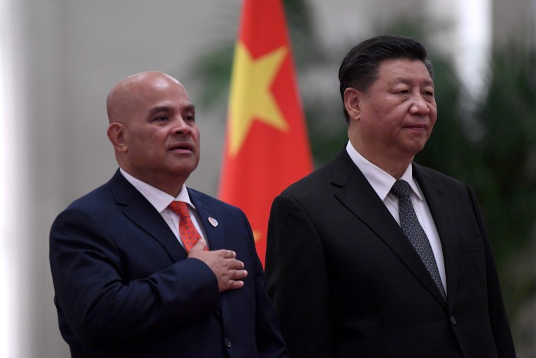 Image: Micronesia's President David Panuelo stands beside China's President Xi Jinping during a welcoming ceremony at the Great Hall of the People in Beijing