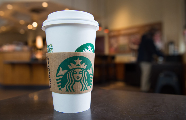 A Starbucks coffee cup.