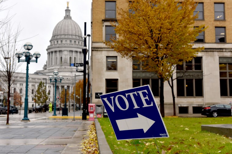 Image: A sign for a polling place near the state capitol in Madison, Wis., on Nov. 6, 2018.