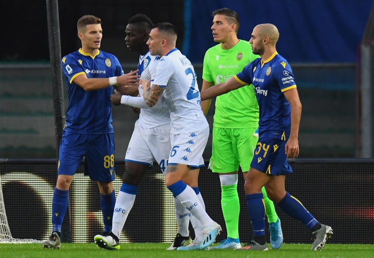 Image: Mario Balotelli #45 of Brescia Calcio reacts to racist chants from Verona fans during the Serie A match between Hellas Verona and Brescia Calcio at Stadio Marcantonio Bentegodi