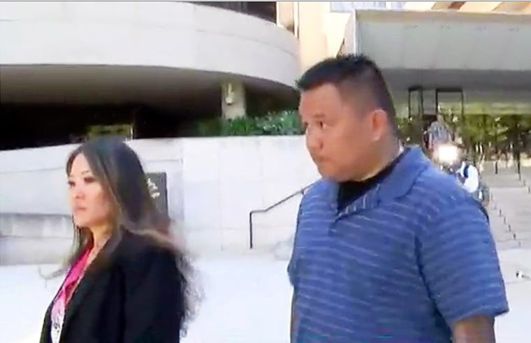 Image: Honolulu police officer John Rabago outside federal court in Honolulu.