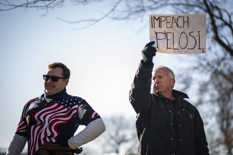 Image: Supporters of President Donald Trump gather near the Capitol as the House debates before a vote on the articles of impeachment on Dec. 18, 2019.