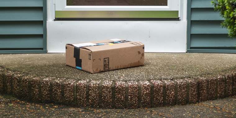 Image: Package left out in the rain exposed on a front porch